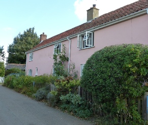 Pink cottages in Theberton.