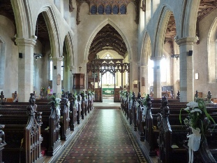 The interior of Woolpit Church.