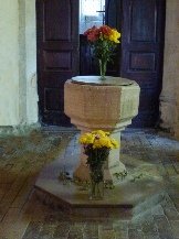 The font in Hinderclay Church.
