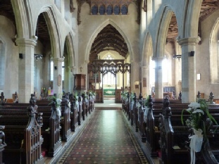 The interior of Woolpit Church.